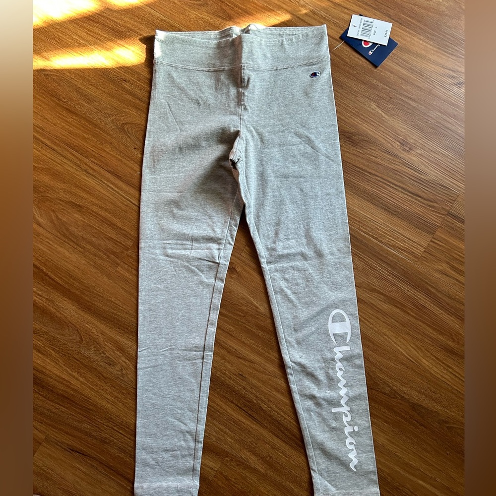 Girls grey champion leggings. New with tags. Size large